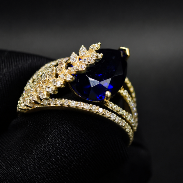 Blue Sapphire Pear Moissanite Ring