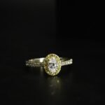 Oval Cut White and Yellow CZ Halo Ring