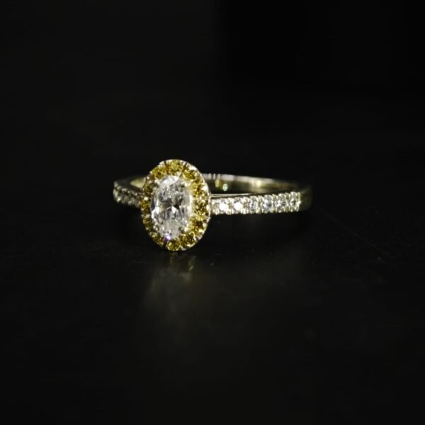 Oval Cut White and Yellow CZ Halo Ring